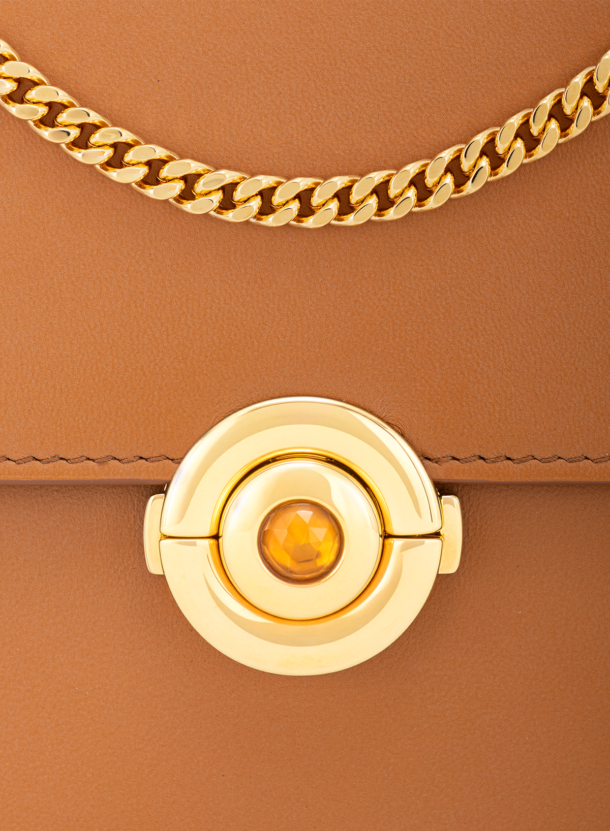 Amoura Citrine Push Lock in Bruno, close-up detail