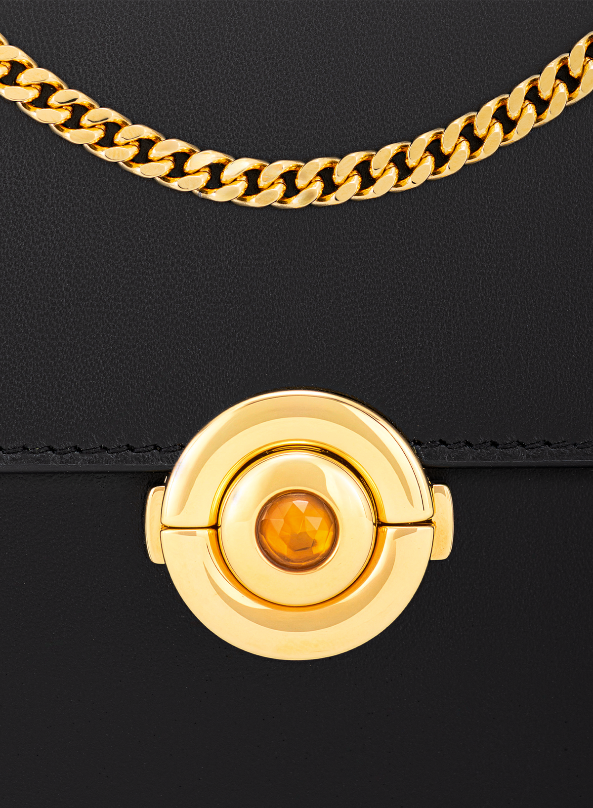 Amoura Citrine Push Lock in Obsidian, close-up detail