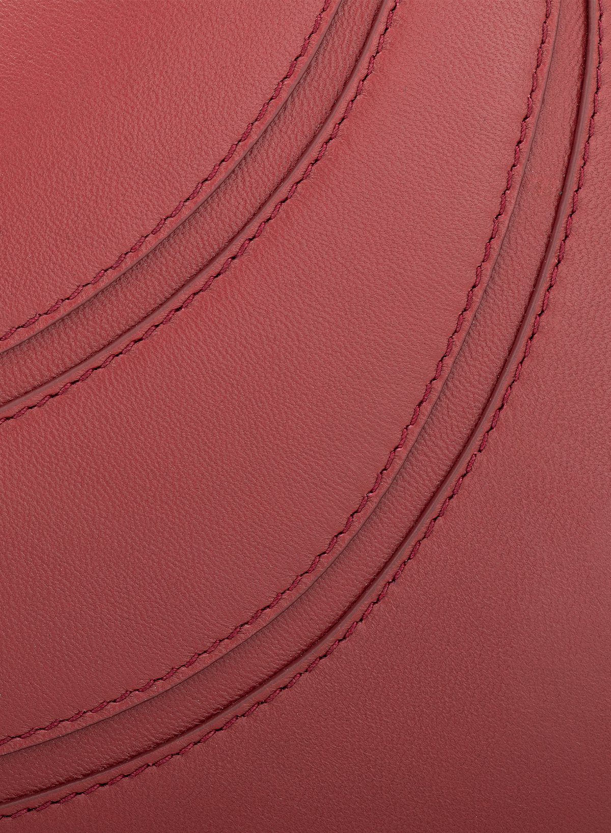 Velora Cutwork in Lava Red, close-up detail