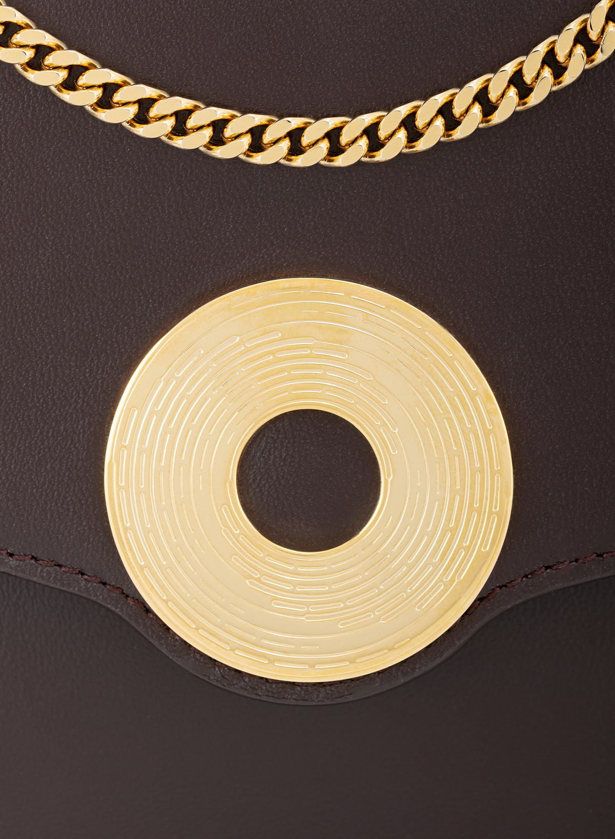 Amoura Monogram in Mahogany, close-up detail